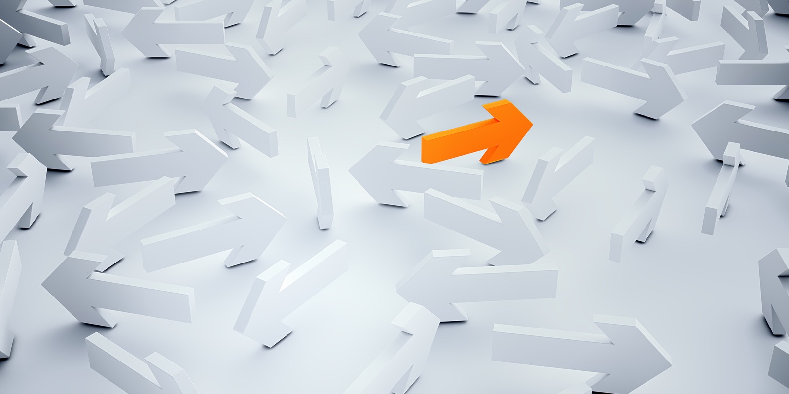 Orange arrow points purposefully through a field of scattered white arrows